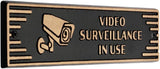Art Deco “Video Surveillance In Use” Cast Aluminum Plaque – Gold on Black – Durable Door or Gate Sign – Made in USA – 7.5” x 2”